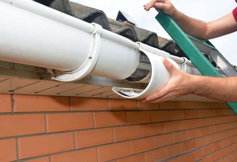 Downspout Reattachment in Boulder, CO